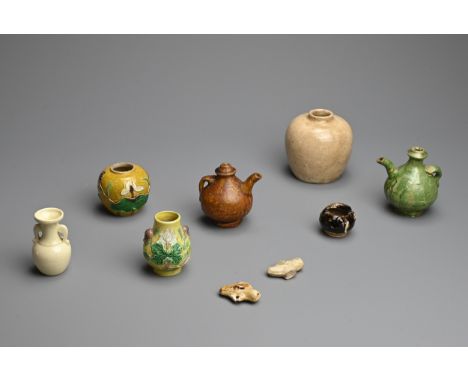 A MIXED GROUP OF CHINESE CERAMIC ITEMS, TANG DYNASTY AND LATER. To include two glazed pendant whistles and brown glazed minia