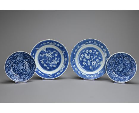 TWO PAIRS OF CHINESE BLUE AND WHITE PORCELAIN DISHES, EARLY 18TH CENTURY. Decorated with peony blooms and prunus branches. Th
