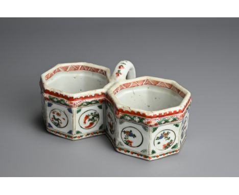 A RARE CHINESE FAMILLE VERTE EXPORT PORCELAIN CRUET HOLDER, 18TH CENTURY. Each pot of octagonal form joined by a single handl