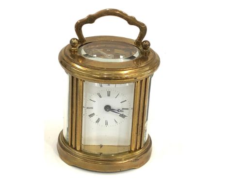 Small vintage brass carriage clock working order but no warranty given 