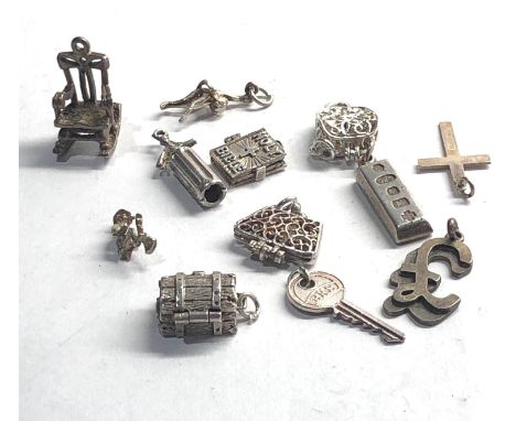 Selection of 12 vintage silver charm bracelet charms 