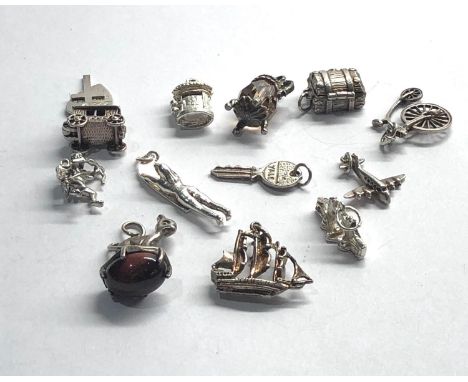 Selection of 12 vintage silver charm bracelet charms 