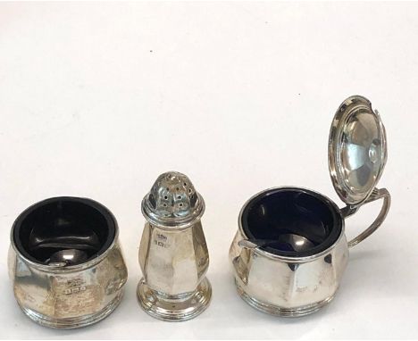 Vintage silver cruet set complete with blue glass liners and spoons Birmingham silver hallmarks 