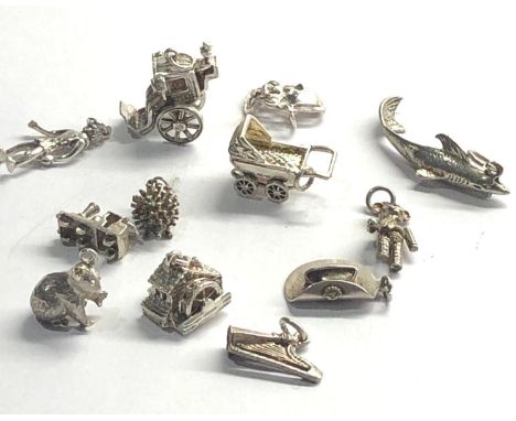 Selection of 12 vintage silver charm bracelet charms 