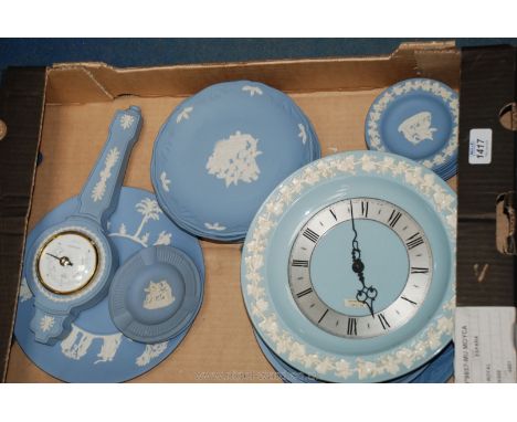 A quantity of light blue Wedgwood Christmas plates, a Wedgwood Barometer, Wedgwood metamec wall clock, etc