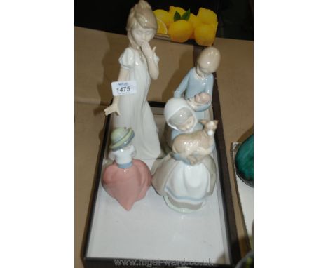 Four Nao Figurines including mother with child, child yawning, etc