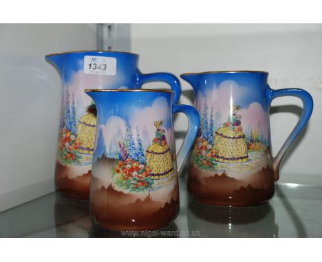 Three graduated Crinoline lady jugs by Sylvac