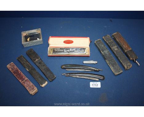 A quantity of six boxed flat razors, some hollow ground including A Little Beauty, two loose flat razors, a boxed Mosda Strea