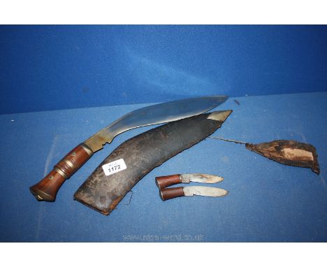 A Gurkha 'Khukuri' Hunting Knife having two small knives (all a/f)