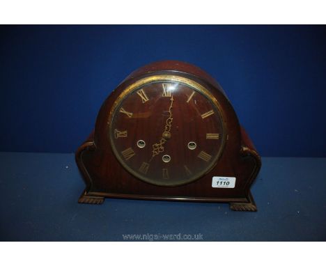A Smiths Art Deco walnut eight day Mantle Clock, domed case with Roman numeral face, Westminster chime.  12 1/4" wide x 9" hi