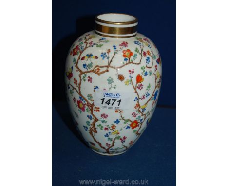 A Spode Vase with floral and butterfly pattern