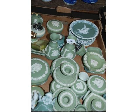 A quantity of green Wedgwood jasper ware and similar trinket pots, pin dishes, ashtrays, candlesticks, compacts, lighters, et