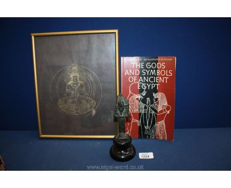 An Egyptian 'Osaris' figure on wooden base 'Osaris', a book "The Boys and Symbols of Ancient Egypt" and a Print with gold rim