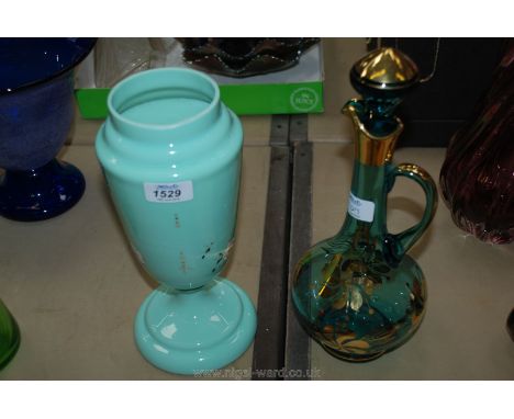 A Victorian Opaline glass Vase in creamy green with three white flowers having gilded trims and dots, 11" tall; together with