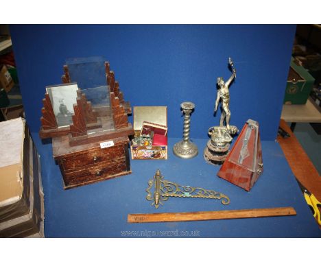 A box of miscellaneous including miniature oak two drawer chest, a modern metronome, a Velos wooden ruler, three Art Deco oak