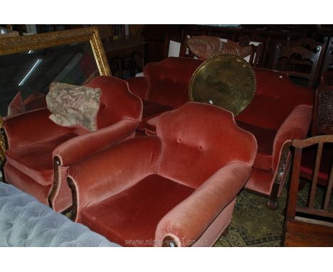 A good Mahogany show framed three piece Suite comprising three seater Settee and two Armchairs, shaped backs, button detail t