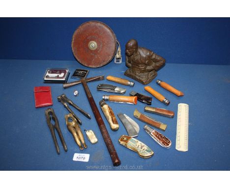 A quantity of miscellanea including penknives, nutcrackers, Chesterman tape measure, ice pick, ruler, lighter, etc.