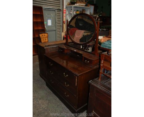 An Edwardian mahogany Dressing Chest; oval mirror in finial top tapering square supports on shelf with two small jewellery dr