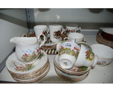 A Duchess china part Teaset including three mugs, two wall plates and a tray, all with Hunting scene decoration