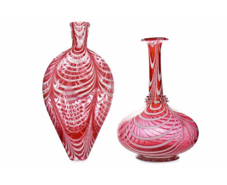 NAILSEA RUBY GLASS FLASK22cm long; together with a Nailsea ruby glass vase with long neck and squat bulbous body, 21cm high (