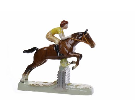 BESWICK MODEL OF GIRL ON JUMPING HORSEnumber 939, printed factory mark to base, modelled as a girl jumping a horse over a fen