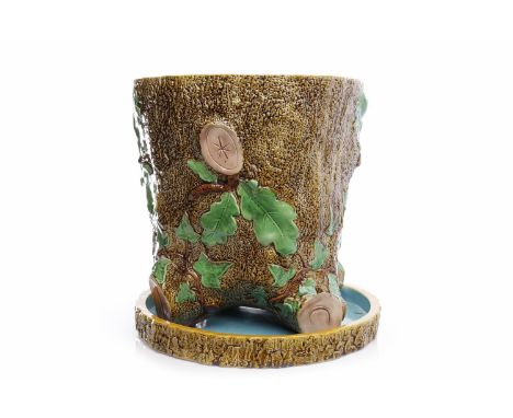 MINTON MAJOLICA PLANTERimpressed with mark for 1871, pattern no 136, modelled as trunk of an oak tree, blue interior, with pl
