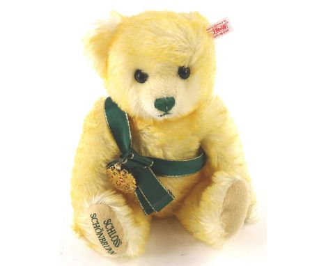 A Steiff limited edition Schloss Schonbrunn limited edition musical bear, with white label to ear and certificate, purchased 