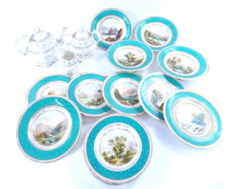 A late 19thC English porcelain dessert service of topographical design, with variant landscapes with central reserves enclose