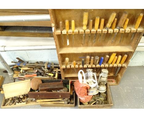 A large quantity of wood working tools, to include a variety of chisels, clamps, drill bits, hammers etc.
