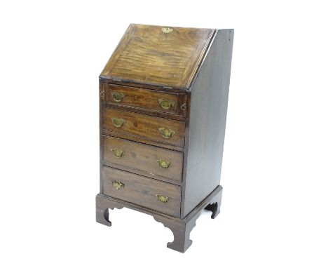 A mahogany bureau, fall enclosing a stepped interior above later graduated drawers on bracket feet, adapted from a larger pie