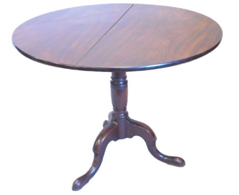 A 19thC walnut occasional table, the circular tilt top on a turned column, tripod base with pad feet, 91cm dia.