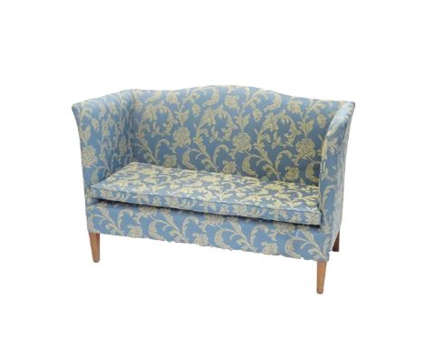 A 19thC mahogany sofa, upholstered in blue and gold pattern fabric on square tapering legs.