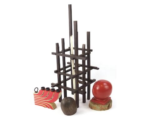 Miscellaneous sculpture type items, to include an ebony lattice standing sculpture, a turned wooden and terracotta painted fi