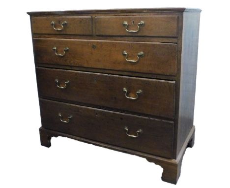 An mid 18thC oak chest of drawers, the top with a moulded edge above two short and three long drawers on bracket feet, 92cm H