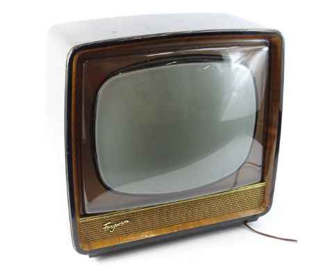 A mid 20thC retro Ferguson television, in walnut case, and front grill speaker, 52cm W, with 15" screen.