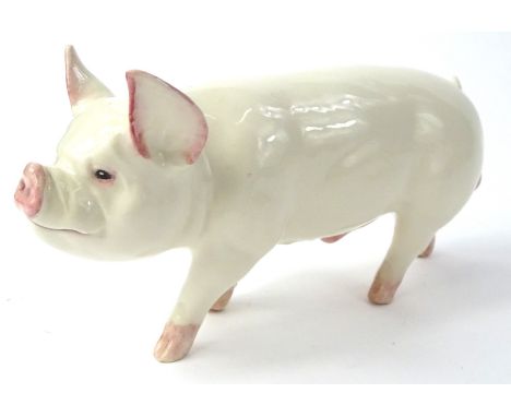 A Beswick ceramic model of a male pig, 18cm L.