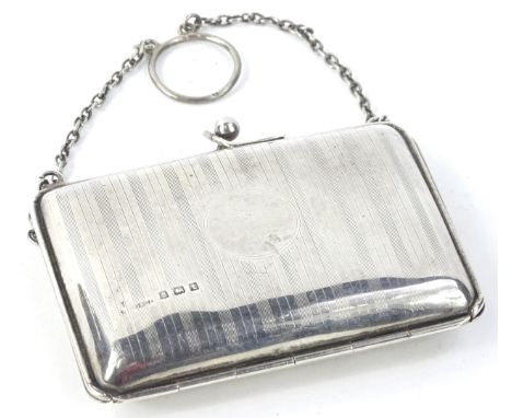 A George V silver purse, with engine turned striped decoration, Birmingham 1918.