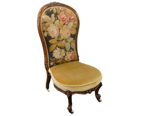 A Victorian walnut spoonback showframe chair, with a padded floral Berlin woolwork back, a velvet seat, on cabriole legs with