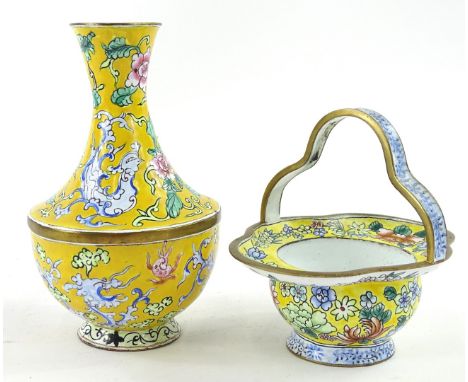 A 20thC oriental enamel basket, of small proportion with shaped handle and shaped oval body, polychrome decorated with flower