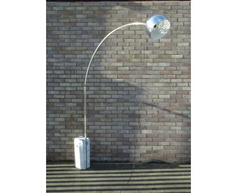 An Arco floor lamp designed by Achille Castiglione, with a marble base and a brushed aluminium arm and shade. First designed 