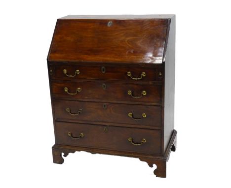 A 19thC mahogany bureau, the fall enclosing a fitted interior over four graduated drawers with drop brass handles and bracket