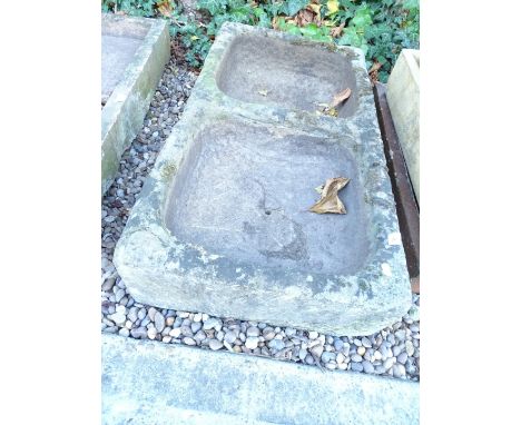 A hewn stone double sink or trough, 97cm W.