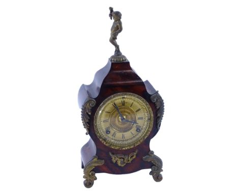 A 19thC painted cartel style mantel clock with gilt brass mounts and cherub finial, eight day movement, 40cm H.