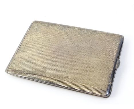 An Edward VIII silver engine turned cigarette case, engraved to the interior with inscription 'with best wishes and in apprec