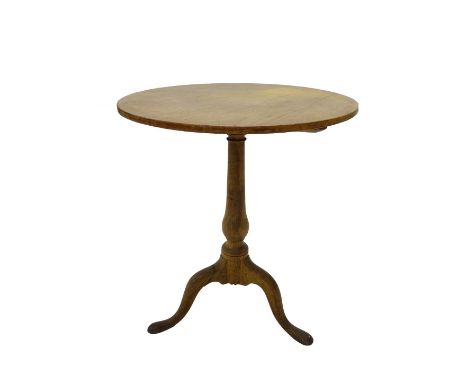 A 19thC oak and pine occasional table, with circular top on a turned column and tripod base, top and bottom associated, 60cm 