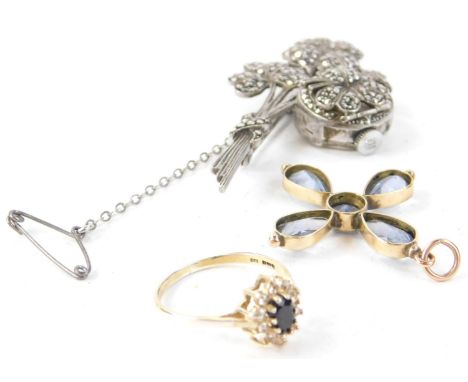 A collection of jewellery, to include a yellow metal cross inset with blue coloured paste, a sapphire and diamond dress ring 