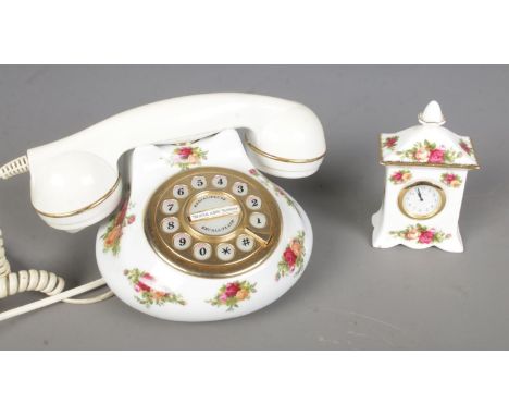 Two pieces of Royal Albert Old Country Roses ceramics to include rotary phone and small mantel clock.  