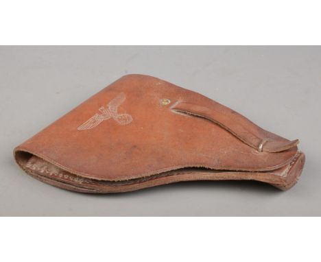 A World War Two French Mab Model D leather gun holster with German capture stamps.  