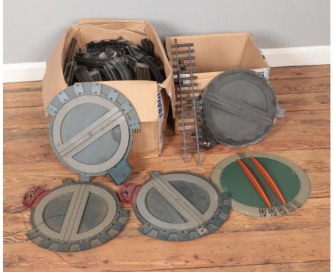 Two boxes of assorted model railway track to include large quantity of OO gauge, Hornby Dublo and several turntables includin