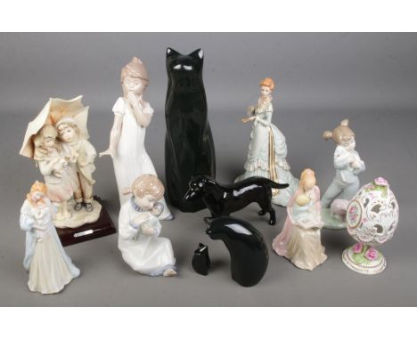 A collection of figurines including Nao figures of yawning girl and girl with doll, The Franklin Mint Victoria Rose Garden Co